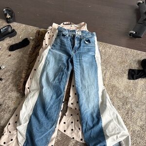 Two designer jeans